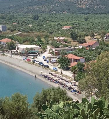 Karvelas Apartment | Idyllic Escape at Small Paradise in Kamares: Oceanfront Bliss
