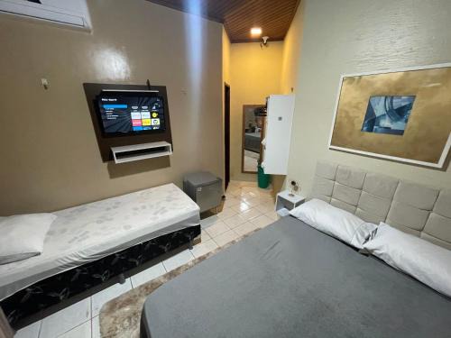 Cacari House | Top-Rated Smart Suíte with Pool and Kitchen Amenities