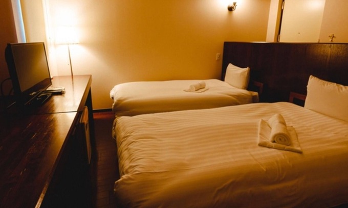 Aira Hotel | Inviting Twin Room with Kitchen & Scenic Views in Kagoshima