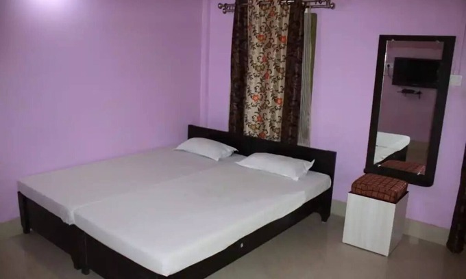 Golaghat Hotel | Cozy Sneha Bhawan: Your Perfect Family Getaway