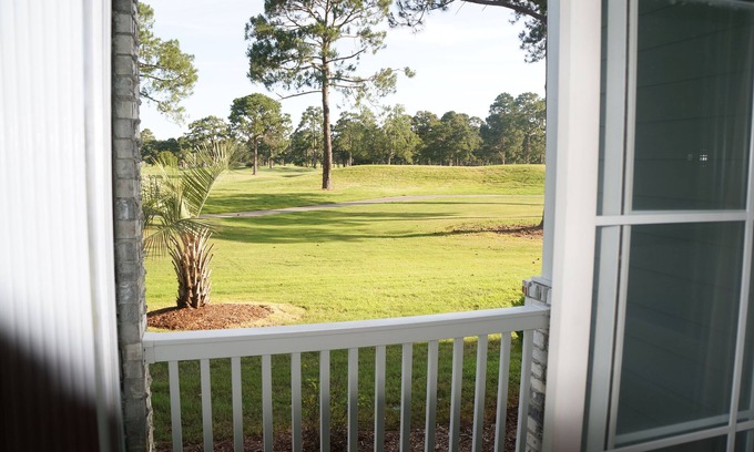 Central Myrtle Beach Condo | Ground Floor Retreat with Golf Course Views & Pool Access