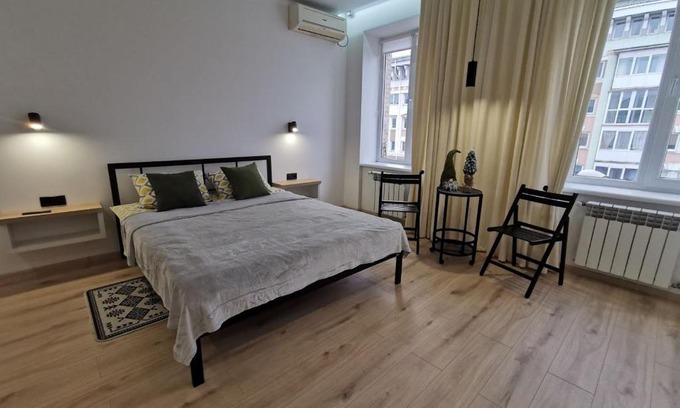 Rivne Apartment | Discover Soborna Apartment: 4-Star Retreat with Pool & Dining