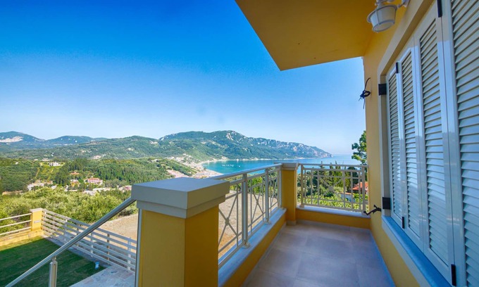 Termenades Apartment | Sofia Apartment 3 - panoramic sea view over the entire bay of Agios Georgios Pagi