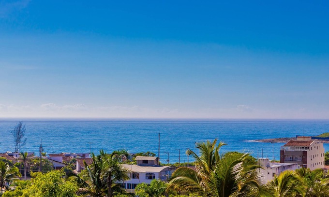 Nova Guarapari Apartment | Relaxing Sofiatti Rentals: Oceanfront Bliss Near Bacutia