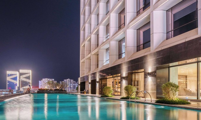 Long Hua Hotel | Elegant Sofitel Haikou: 5-Star Luxury with Pool & Spa