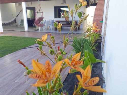 Prado House | Nature-Inspired Solar das Sabiás: Pet-Friendly & Oceanfront