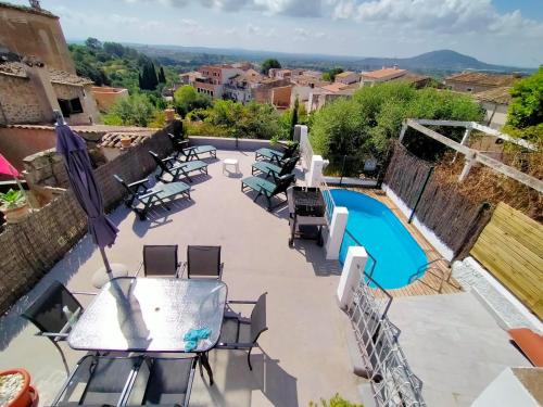 Campanet House | Son Massanet: Poolside Retreat with Scenic Views