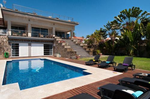 Sonnenland Villa | Ideal Sonnenland House for 12: Rated 9.6 with Pool Access
