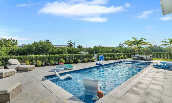 Coury House | Sophisticated 5-bedroom, elevator, 50' dock, heated pool/spa, sleep 12