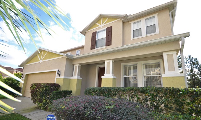 Windwood Bay House | Inviting South Facing Pool Home with Secluded Deck & Spa