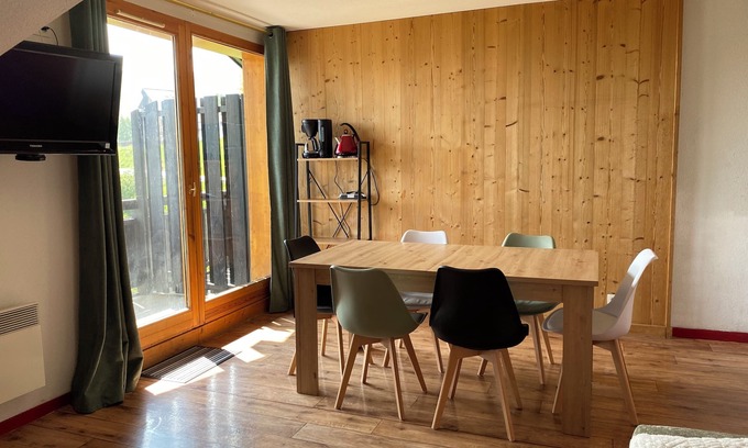 Montgellafrey Apartment | South-facing, large living room, mountain views and private covered parking.
