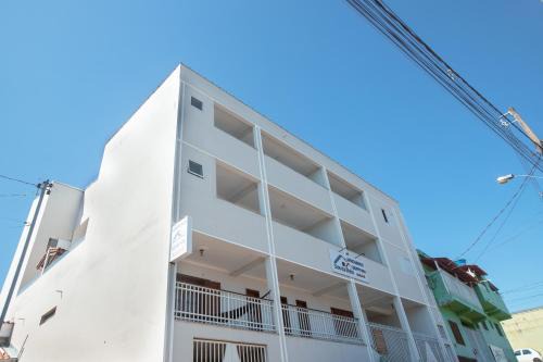 Sao Thome das Letras Apartment | Discover Souza Reis Apart - Family-Friendly with Kitchen