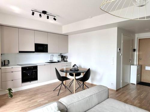 Keskinen District Apartment | Bright 1BR Retreat with Balcony, Rated 9/10 by Guests