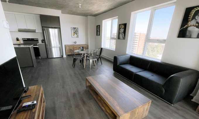 Saint-Laurent Condo | Spacious 2BR with Skyline Views, Near Place Vertu