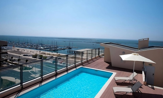 Olhao Hotel | Ideal 3BR Retreat with Kitchen & Pet-Friendly Perks!