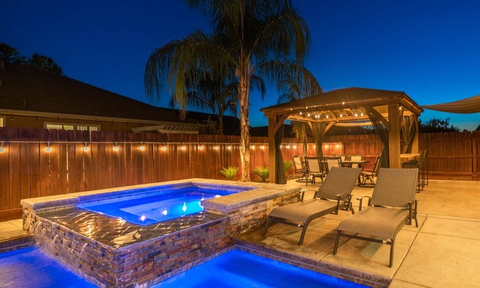 Raisin House | Inviting 5-Bedroom Home with Pool & Hot Tub Retreat