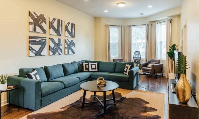 Uptown Apartment | Bright and Inviting Apartment with On-Site Parking!