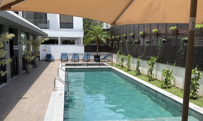 Campeche Leste Apartment | Spacious and beautiful Studio with swimming pool, terrace and barbecue! 500 meters from the beach!