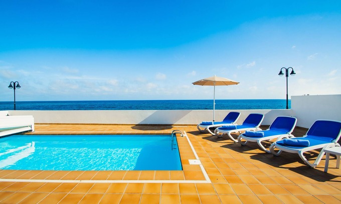 Arrieta Villa | Oceanfront Retreat: Perfect Home by the Sea in Arrieta