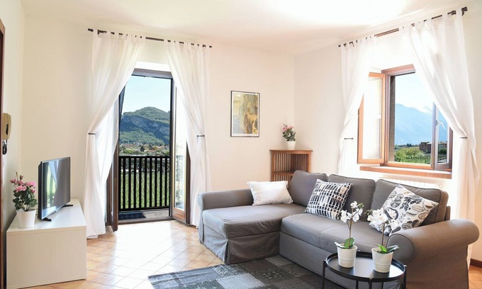 Riva del Garda Apartment | Elegant Oceanfront Holiday Apartment "Mandorlo" with Balcony