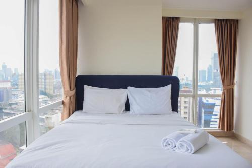 Cikini Apartment | Elegant 3BR Retreat at Menteng Park Apartment by Travelio