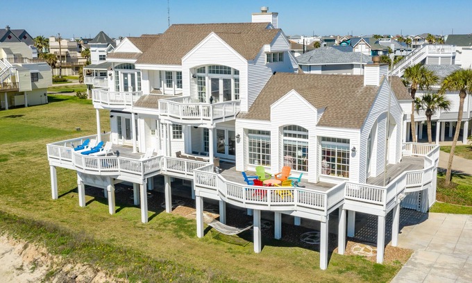Pirates Beach House | Beachfront Oasis with Ocean View, Hot Tub & Chef's Kitchen