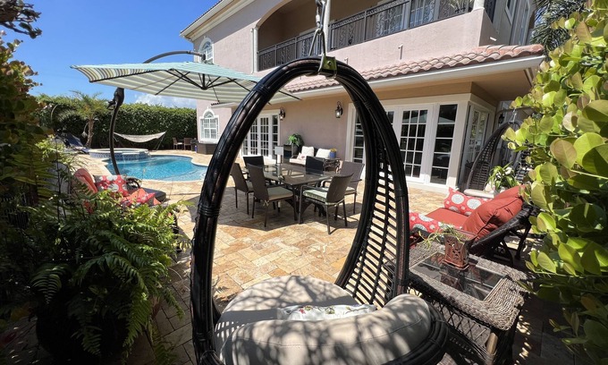 Garden Isles House | Beautiful 4-Bedroom Retreat with Heated Pool & Ocean View