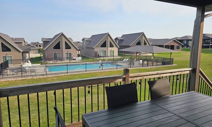 Arnolds Park Cabin | Idyllic Bridges Bay Poolside Cabin with Ocean View Amenities