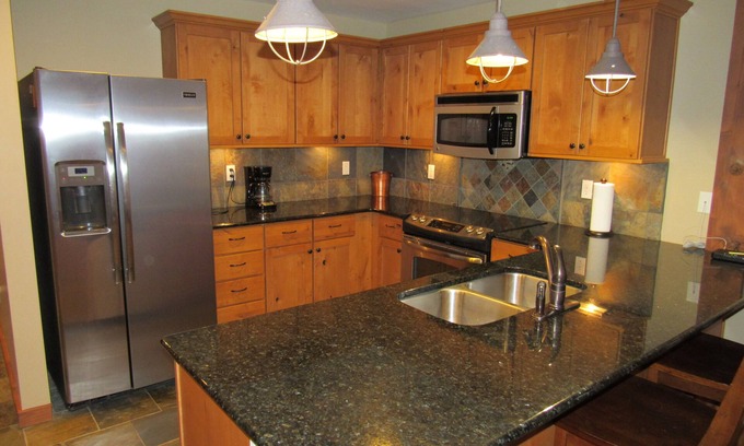 Kellogg Condo | Guest Rated 9.8: Condo with Balcony, Hot Tub & Spa Amenities