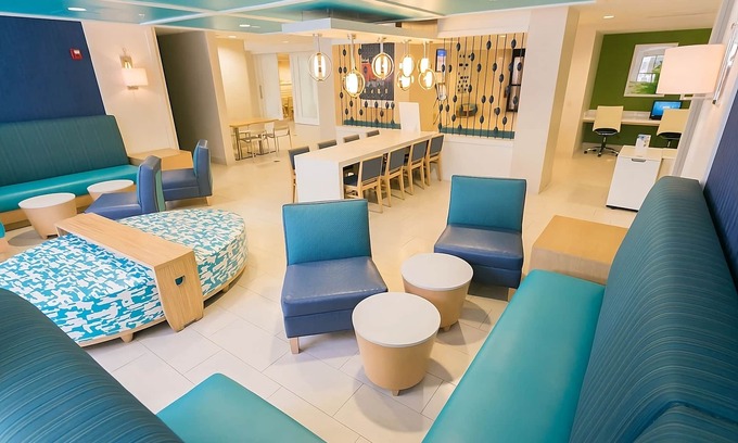 Florida Central Atlantic Coast Hotel | Family Suite with Pool & Shuttle to Orlando Attractions