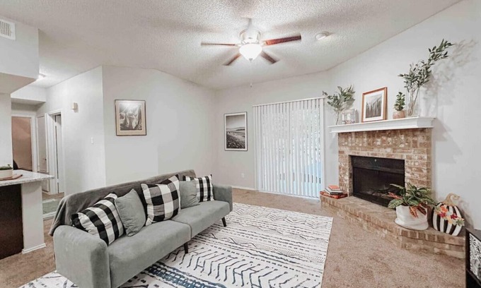 South Side Apartment | Inviting 2-Bedroom Retreat Nestled Among Shaded Oaks