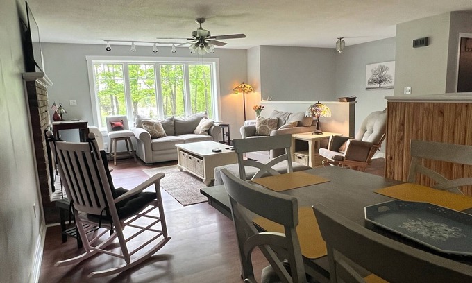 Pittsburg House | Spacious five-bedroom home off Back Lake with direct trail access on Spooner Rd