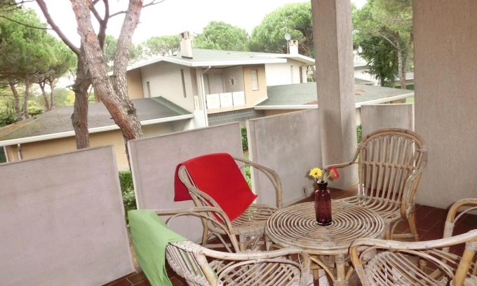 Bibione Apartment | Inviting Flat with Garden, Fireplace & Pool for Families