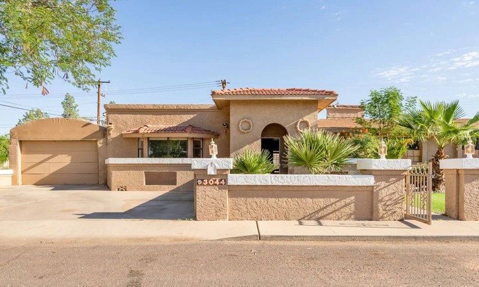 Alhambra House | Exceptional Home with Heated Pool, Ocean View & Sports Court