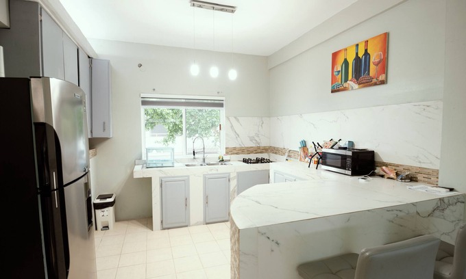 Corozal Apartment | Spacious hotel suites with 8 bedrooms and WiFi, AC in charming Corozal