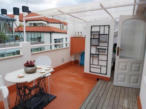 La Coruna Old Town House | Inviting House with Terrace and Balcony in A Coruña