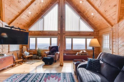 Howard House | Inviting Howard Cabin with Wraparound Deck and Scenic Views