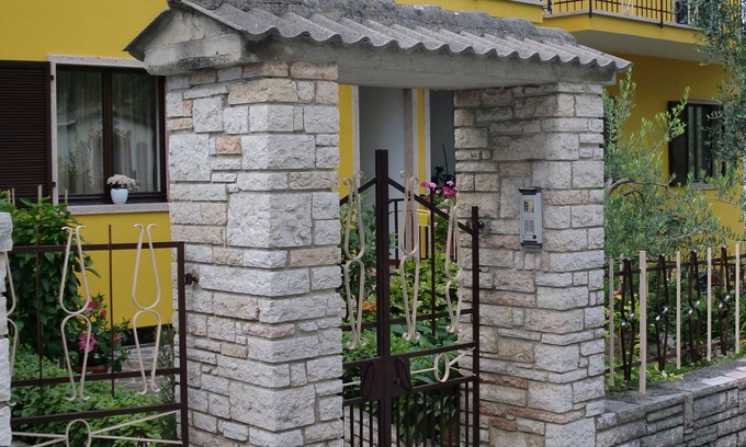Assenza Apartment | Picturesque Lake View Apartment with Modern Amenities