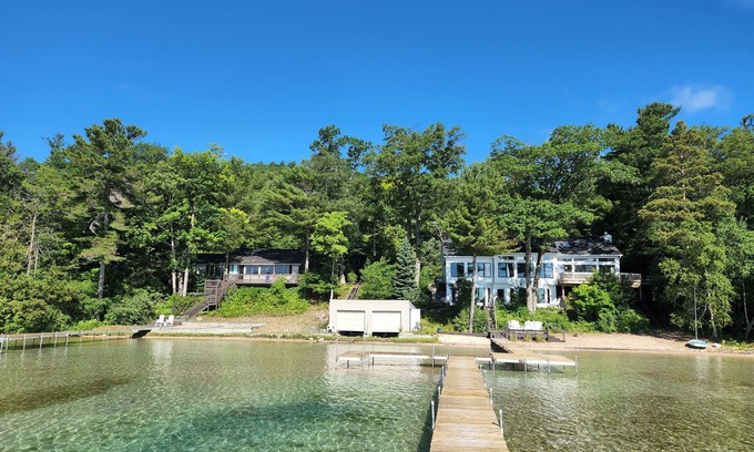 Empire House | Idyllic Lakefront Escape with Private Beach & Docks