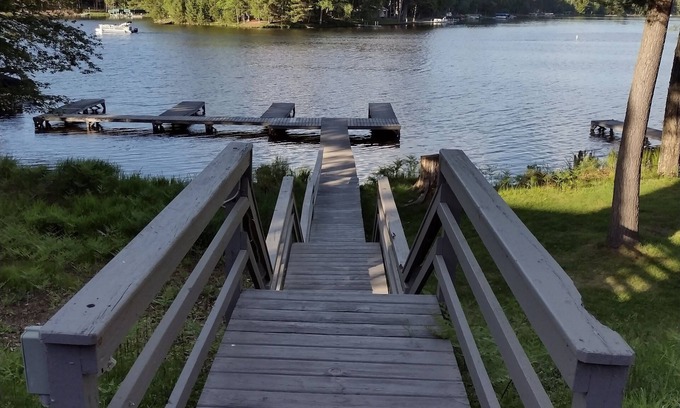 St Germain Condo | Top-Rated Lakefront Snowmobile Lodge Condo with Pool & Spa