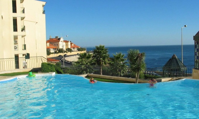 Parede Apartment | Stunning Ocean View Apartment with Pool & Beach Access