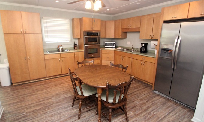 Waterford Cottage | Pet-Friendly Lakefront Cottage with Hot Tub & High Rating