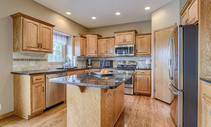 Omaha House | Inviting Pool House with Hot Tub and Family-Friendly Amenities