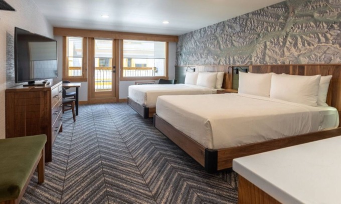 Banff Apartment | Elegant Room with Gas Fireplace & Scenic Balcony Escape