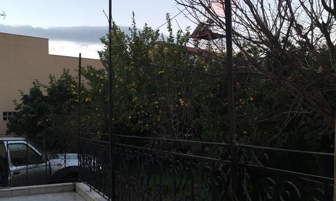 Aigio House | Tree-Lined Townhouse with Kitchen & Breakfast Included