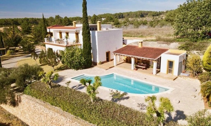Sant Antoni de Portmany Villa | Idyllic Villa with Pool and Lush Garden, Rated 10/10