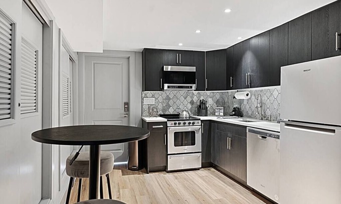 Melrose Condo | Cozy SpeakEasy Suite with Fireplace & Free Parking