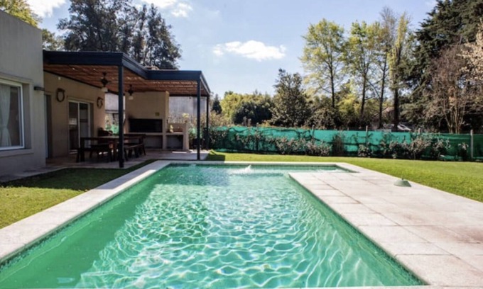 Del Viso Ski Chalet | Relaxing Retreat with Pool and Green Park for Your Holidays