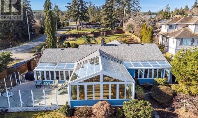 Regional District of Nanaimo House | Inviting Blue Dolphin Walk-on Waterfront with Ocean View