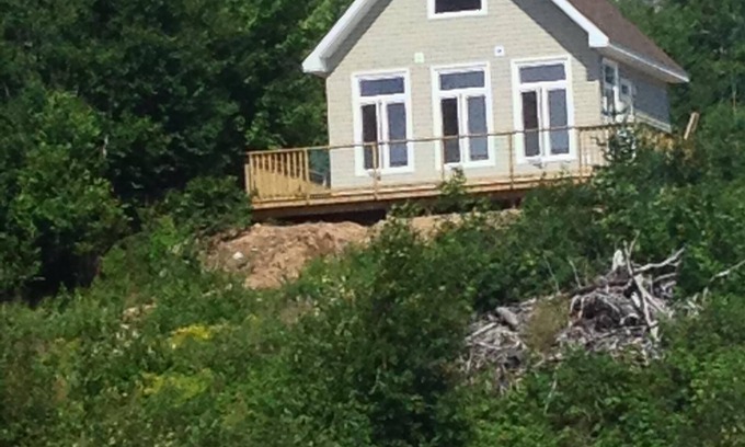 Cape Dauphin Cottage | Serene Ocean View Beach House with Pet-Friendly Amenities